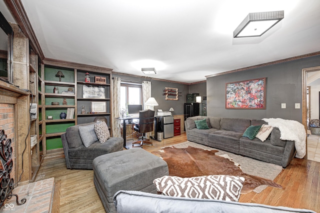 living room featuring a brick fireplace, ornamental molding, and hardwood / wood-style flooring