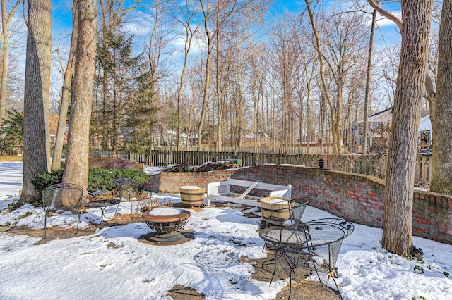 view of snow covered patio