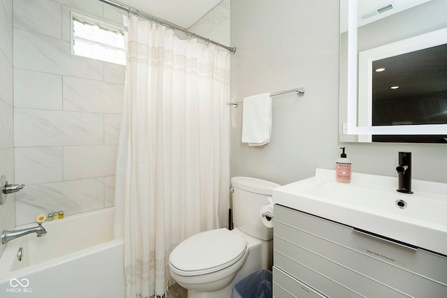 full bathroom with toilet, vanity, and shower / tub combo with curtain