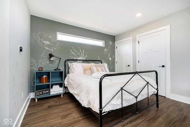 bedroom featuring dark wood-type flooring