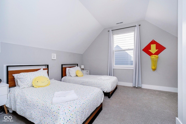 carpeted bedroom featuring vaulted ceiling