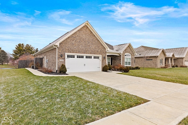 single story home featuring a front yard and a garage