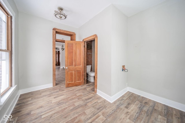 unfurnished room featuring light wood-type flooring