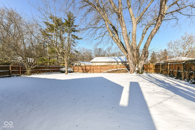 view of yard covered in snow