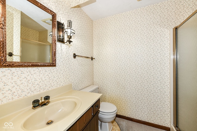 bathroom with tile patterned flooring, vanity, and toilet