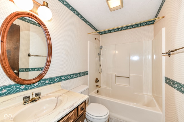 full bathroom featuring vanity, shower / bathtub combination, and toilet