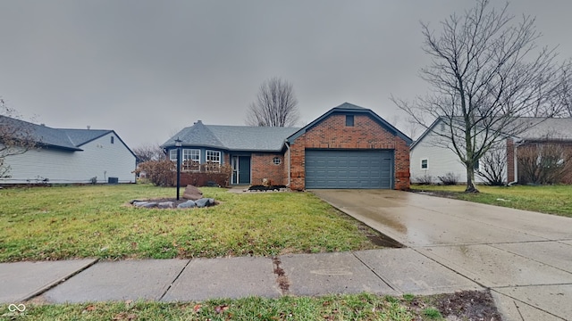 view of front of house with a front yard and a garage