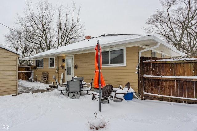 view of snow covered house