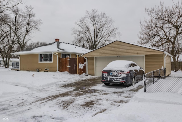 single story home featuring a garage