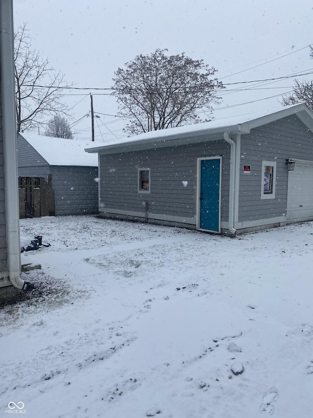 view of snow covered house