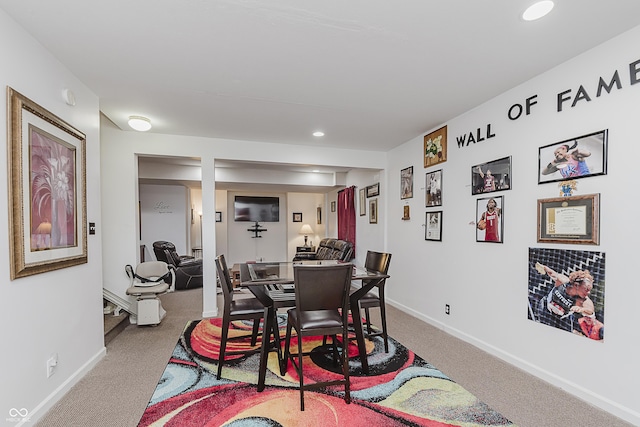 view of carpeted dining space