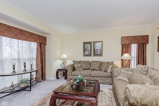 carpeted living room with ornamental molding