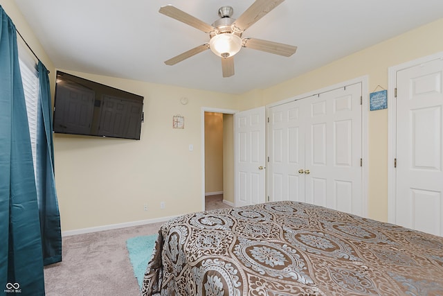 carpeted bedroom featuring ceiling fan