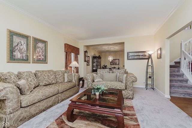 carpeted living room featuring ornamental molding