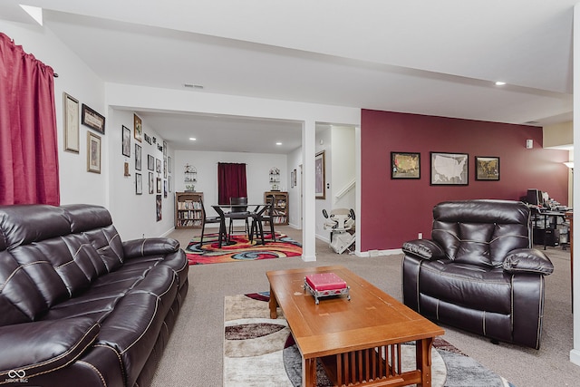 living room with light colored carpet