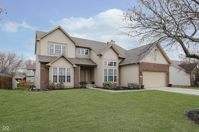 view of front of property featuring a front yard and a garage