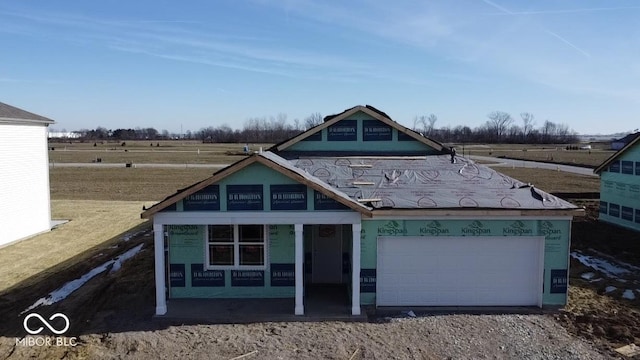 view of front of home featuring a rural view