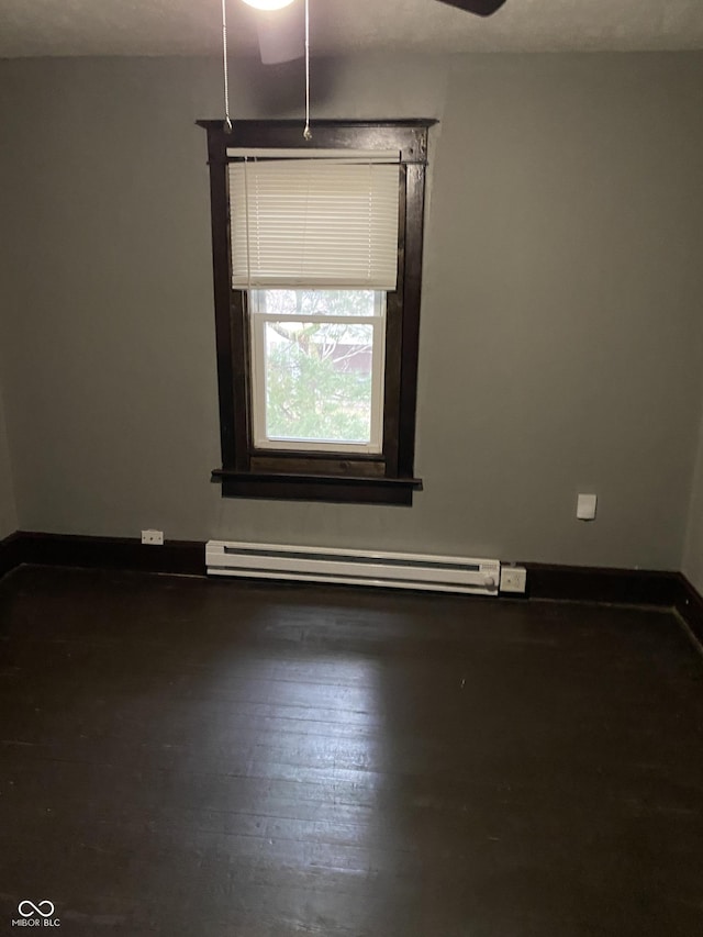 spare room with baseboard heating