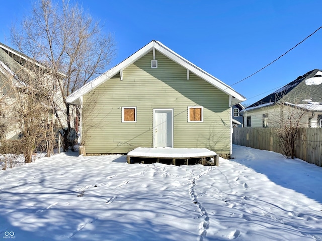 view of snow covered house