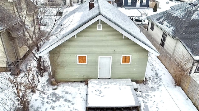 view of snow covered house