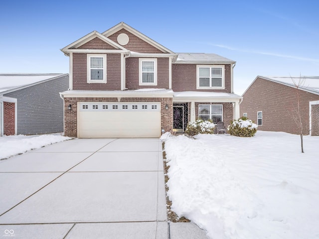 view of front of home with a garage