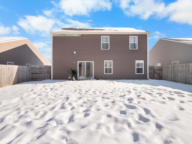 view of snow covered property