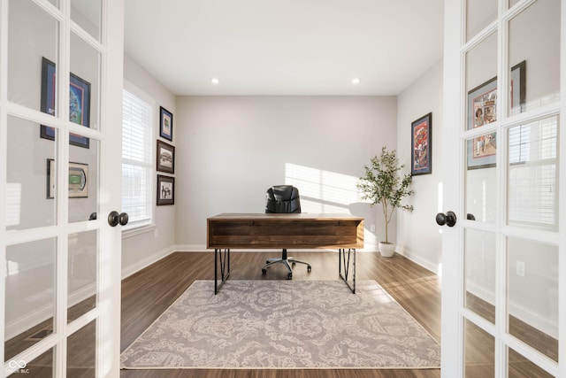 office space featuring dark hardwood / wood-style floors and french doors