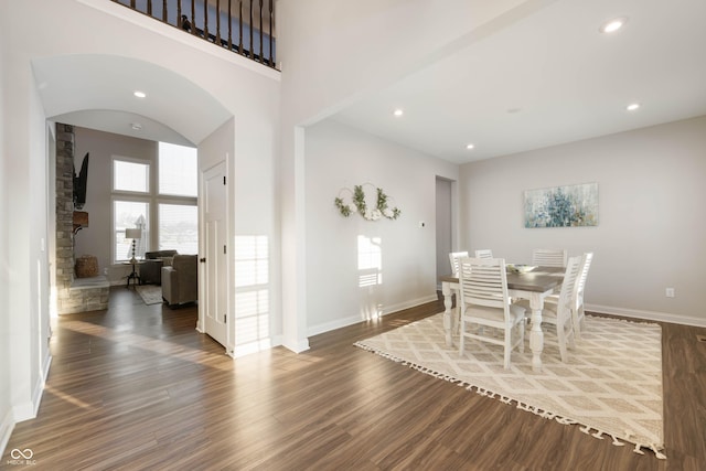 dining space featuring dark hardwood / wood-style flooring