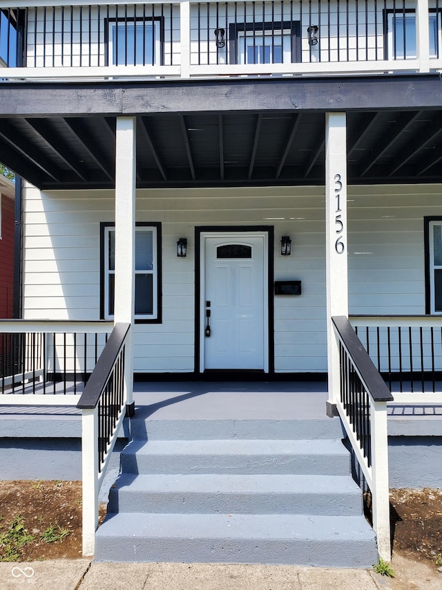 entrance to property with a porch