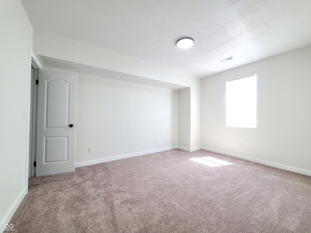 spare room with carpet