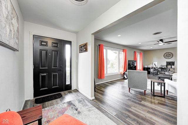 foyer featuring ceiling fan and hardwood / wood-style floors