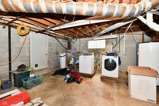 basement featuring washing machine and dryer