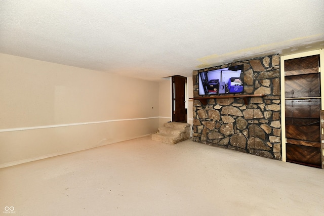 basement with a textured ceiling