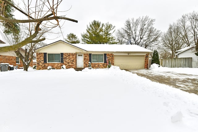 single story home with a garage