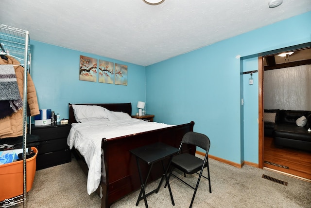 bedroom with light carpet