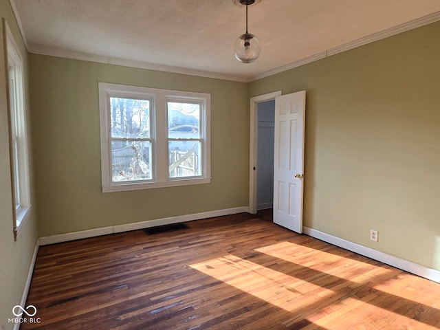 unfurnished bedroom with wood-type flooring and crown molding