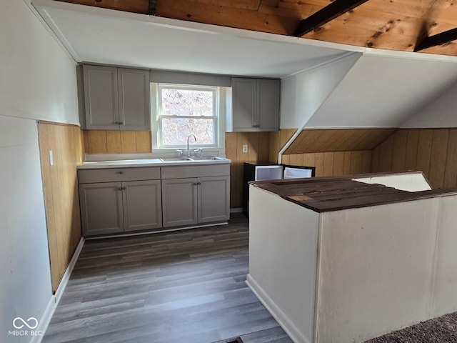 kitchen with gray cabinets, sink, wood ceiling, and dark hardwood / wood-style flooring