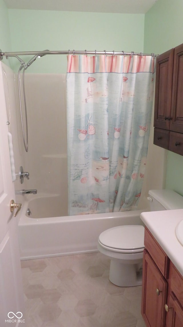 full bathroom featuring toilet, vanity, and shower / bath combo