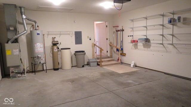 garage with electric panel and water heater