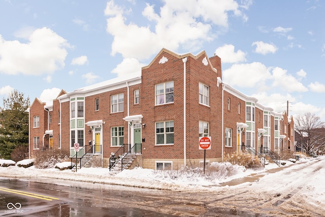 view of snow covered building