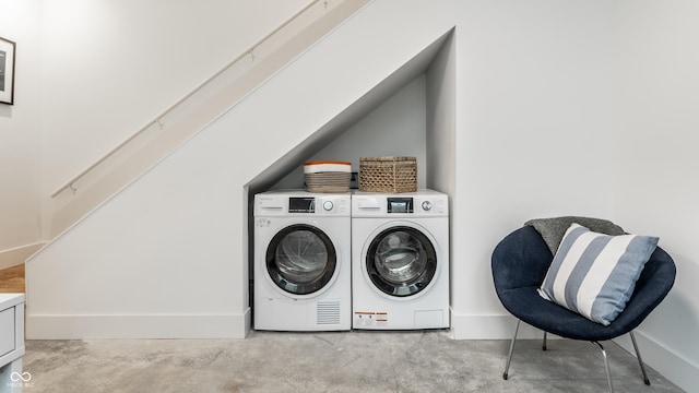 washroom featuring independent washer and dryer