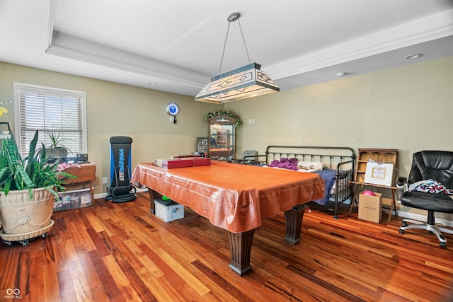 game room featuring baseboards, a raised ceiling, wood finished floors, and billiards