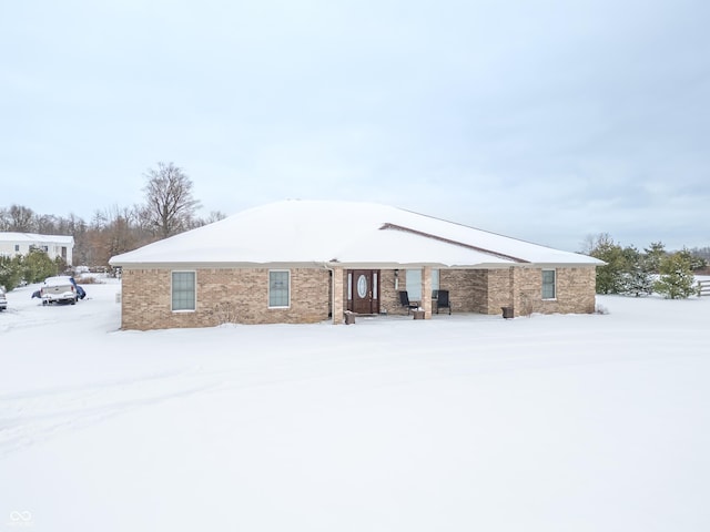 view of snow covered property