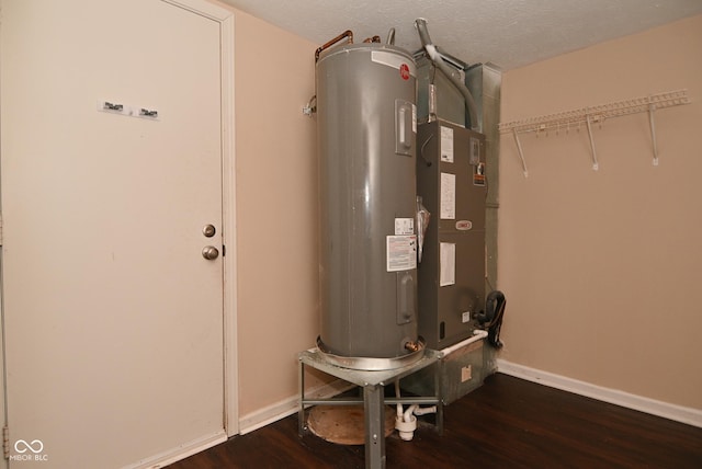 utility room featuring water heater