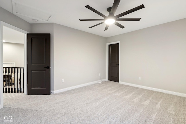 empty room featuring light carpet