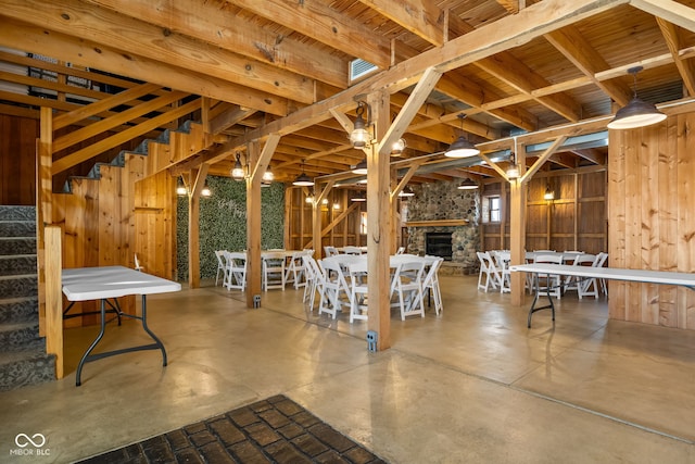 interior space with an outdoor stone fireplace