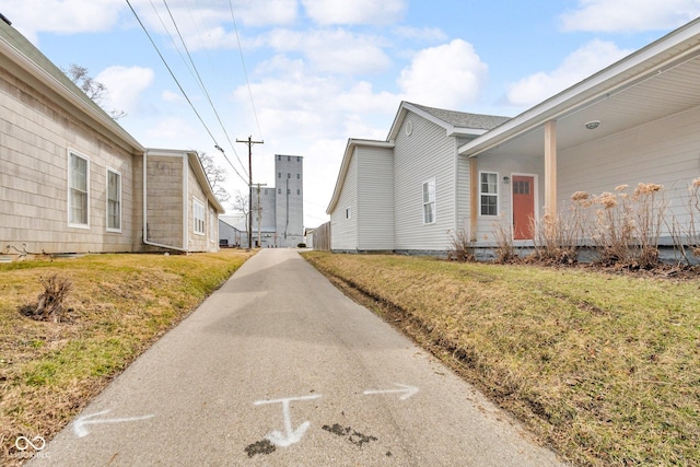 view of road with driveway