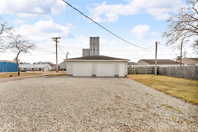 detached garage with fence