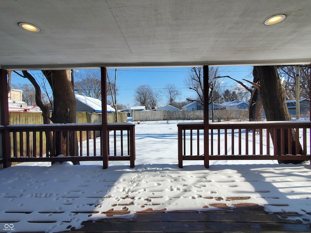 view of snow covered deck