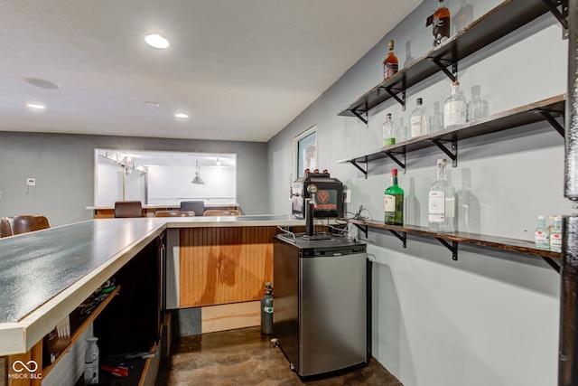 kitchen featuring refrigerator